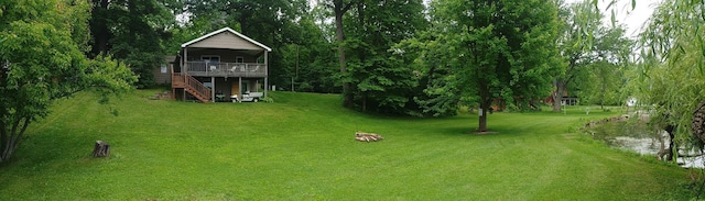 1959 79th St, Georgetown Twp, WI 54853 - view of green lawn featuring stairway and a wooden deck