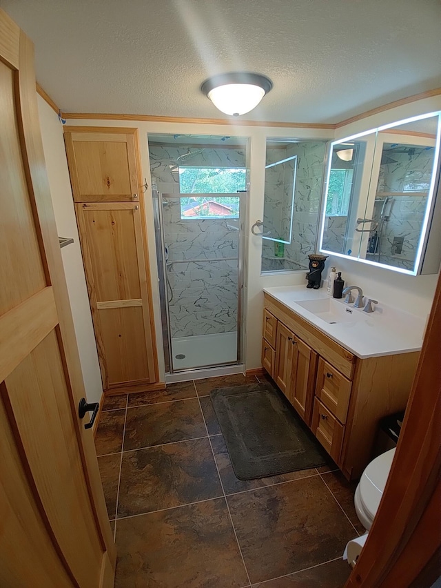 1959 79th St, Georgetown Twp, WI 54853 - bathroom featuring a marble finish shower, vanity, a textured ceiling, and stone finish floors