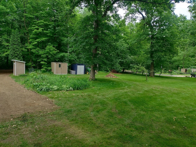 1959 79th St, Georgetown Twp, WI 54853 - view of grassy yard with a storage unit