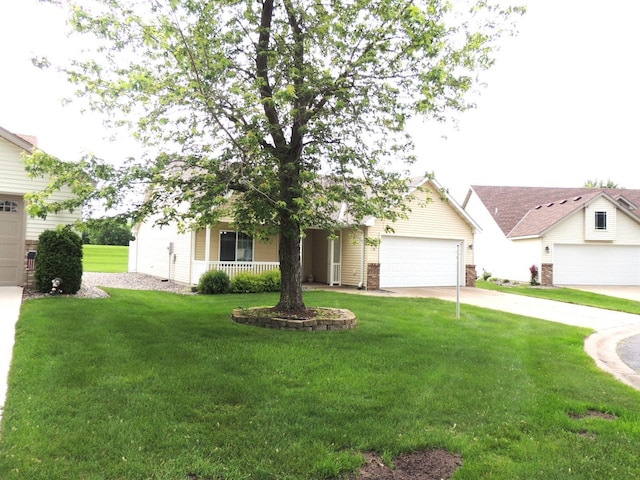 38 Glenview Loop, Saint Cloud, MN 56303 - view of front of home featuring concrete driveway, a front yard, and covered porch