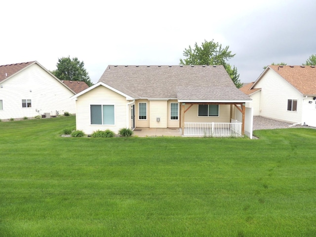 38 Glenview Loop, Saint Cloud, MN 56303 - view of front of property with a front yard, roof with shingles, and a patio