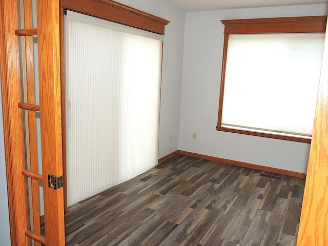38 Glenview Loop, Saint Cloud, MN 56303 - spare room with dark wood-style flooring and baseboards