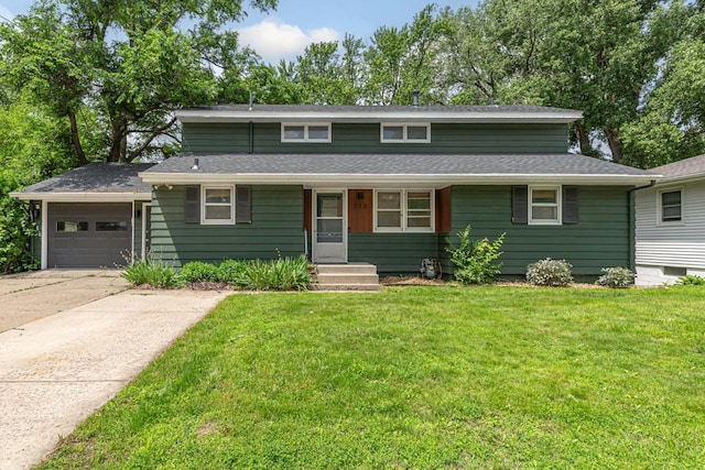 713 Sherman St, North Mankato, MN 56003 - bungalow-style home with concrete driveway, a front yard, and an attached garage
