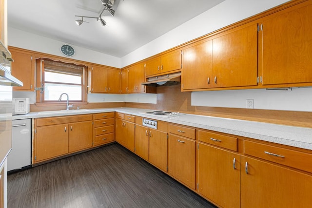 713 Sherman St, North Mankato, MN 56003 - kitchen featuring under cabinet range hood, white appliances, light countertops, brown cabinetry, and dark wood-style flooring