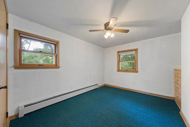 713 Sherman St, North Mankato, MN 56003 - unfurnished room featuring baseboard heating, a ceiling fan, and carpet floors