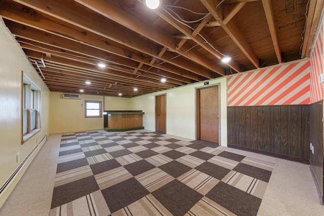 713 Sherman St, North Mankato, MN 56003 - basement with carpet, a baseboard radiator, and bar