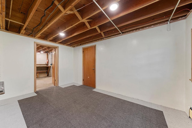 713 Sherman St, North Mankato, MN 56003 - finished below grade area with a baseboard radiator