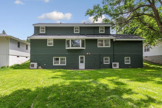 713 Sherman St, North Mankato, MN 56003 - rear view of house with a yard
