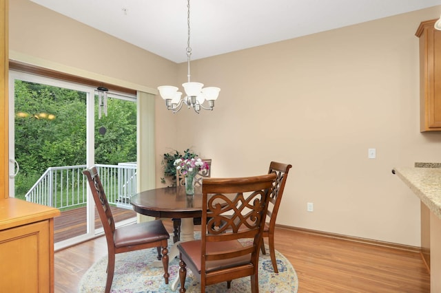 1816 Commonwealth Blvd, Chanhassen, MN 55317 - dining area with a chandelier and light wood-type flooring