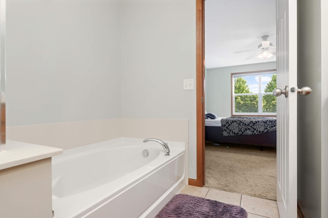 1816 Commonwealth Blvd, Chanhassen, MN 55317 - bathroom featuring ensuite bath, a garden tub, tile patterned floors, ceiling fan, and vanity