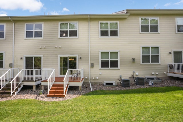 1816 Commonwealth Blvd, Chanhassen, MN 55317 - rear view of property featuring a yard and a wooden deck