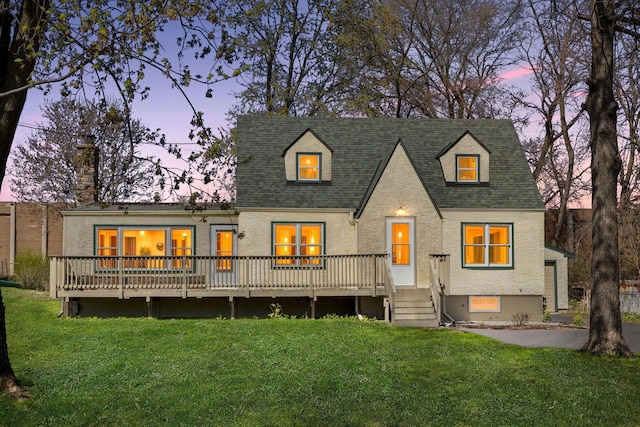 2979 Centerville Rd, Little Canada, MN 55117 - view of front of house featuring a front yard, a deck, a chimney, and a shingled roof