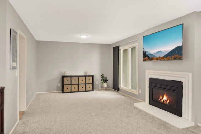 11140 Abbott Ln, Minnetonka, MN 55343 - unfurnished room with carpet floors and a glass covered fireplace