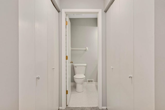 11140 Abbott Ln, Minnetonka, MN 55343 - bathroom with toilet and baseboards