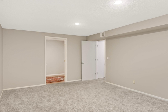 11140 Abbott Ln, Minnetonka, MN 55343 - finished below grade area featuring carpet floors, recessed lighting, and a textured ceiling