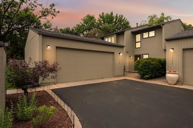 11140 Abbott Ln, Minnetonka, MN 55343 - mid-century home with an attached garage and driveway