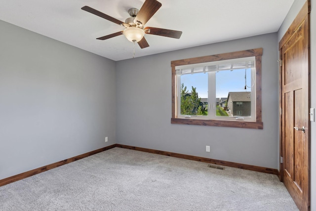 1664 Otter Way, New Richmond, WI 54017 - carpeted empty room featuring baseboards and a ceiling fan