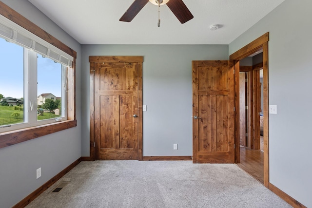 1664 Otter Way, New Richmond, WI 54017 - unfurnished bedroom featuring carpet flooring and ceiling fan
