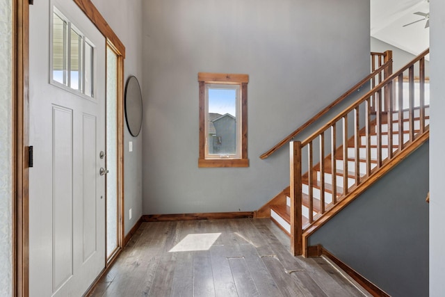 1664 Otter Way, New Richmond, WI 54017 - entryway featuring hardwood / wood-style floors, stairway, a high ceiling, and ceiling fan