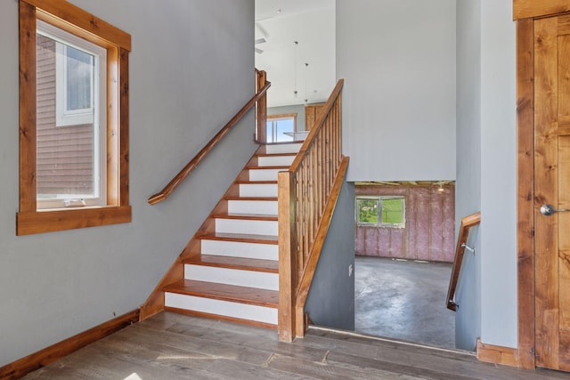 1664 Otter Way, New Richmond, WI 54017 - stairway with a high ceiling and baseboards