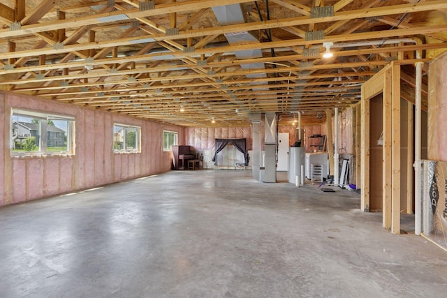 1664 Otter Way, New Richmond, WI 54017 - miscellaneous room with concrete flooring, heating unit, and water heater