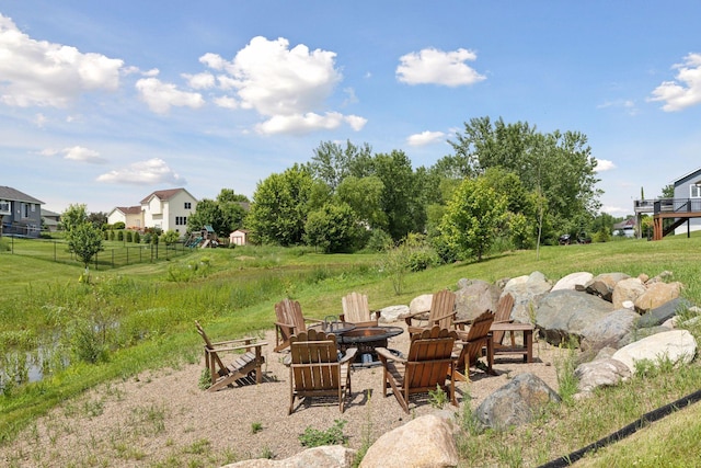 1664 Otter Way, New Richmond, WI 54017 - view of yard featuring an outdoor fire pit