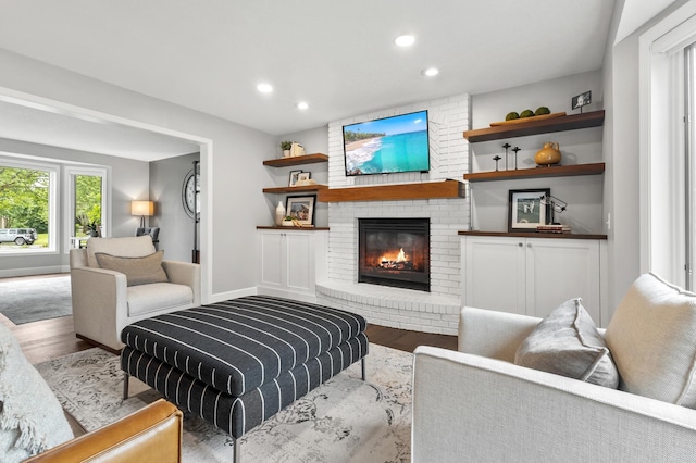 1541 Wexford Ct, Eagan, MN 55122 - living area featuring wood finished floors, a fireplace, and recessed lighting