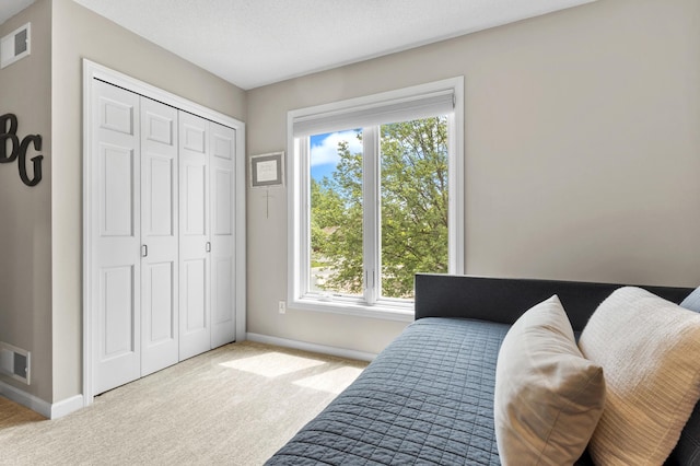 1541 Wexford Ct, Eagan, MN 55122 - carpeted bedroom with multiple windows and a closet