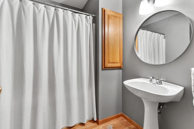 1541 Wexford Ct, Eagan, MN 55122 - full bathroom with wood finished floors and curtained shower