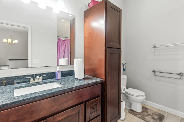 1227 Dupont Ln N, Brooklyn Park, MN 55444 - full bath featuring vanity and a chandelier