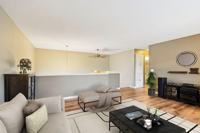 7467 Meadowwood Ct, Brooklyn Park, MN 55444 - living area featuring wood finished floors and a ceiling fan