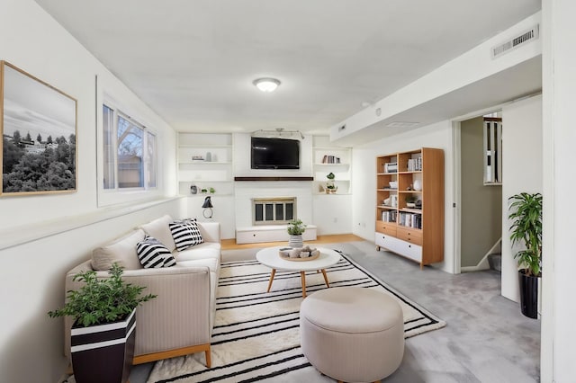 7467 Meadowwood Ct, Brooklyn Park, MN 55444 - living room with a fireplace, stairway, built in shelves, and light carpet