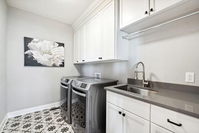 19803 Jersey Ave, Lakeville, MN 55044 - laundry area with cabinet space and washer and dryer