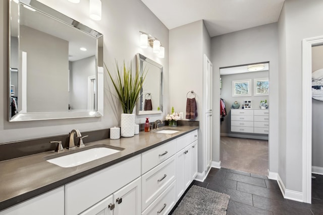 19803 Jersey Ave, Lakeville, MN 55044 - bathroom featuring double vanity and recessed lighting