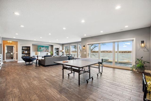 19803 Jersey Ave, Lakeville, MN 55044 - recreation room with wood finished floors, recessed lighting, and a water view