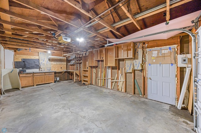 1130 Oak St N, Fargo, ND 58102 - basement featuring a garage and a workshop area