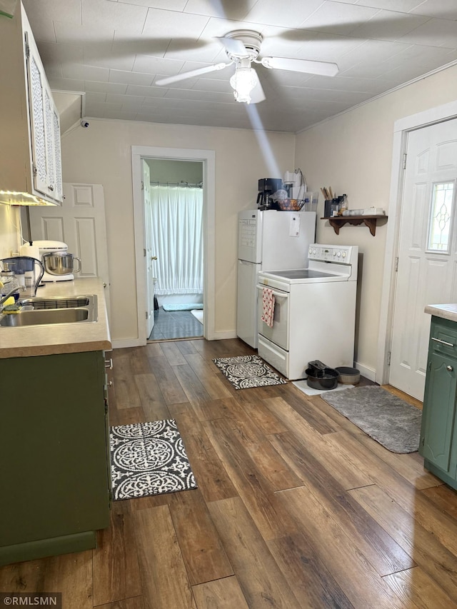 208 Cleveland St SE, Silver Lake, MN 55381 - kitchen featuring green cabinetry, white appliances, dark wood finished floors, ceiling fan, and vaulted ceiling