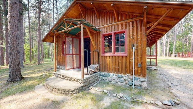 13000 Inlet Cir, Park Rapids, MN 56470 - view of outbuilding featuring a forest view