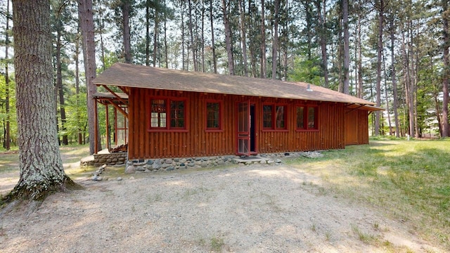 13000 Inlet Cir, Park Rapids, MN 56470 - view of front of house with board and batten siding