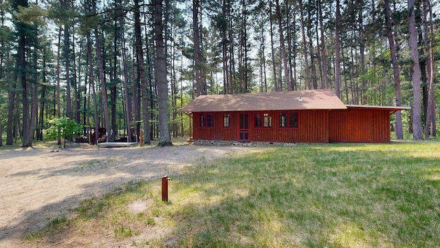 13000 Inlet Cir, Park Rapids, MN 56470 - view of front of property with a front lawn, crawl space, and a wooded view