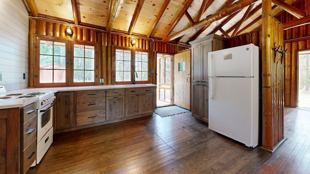 13000 Inlet Cir, Park Rapids, MN 56470 - kitchen with white appliances, dark wood-style floors, healthy amount of natural light, wood walls, and wood ceiling