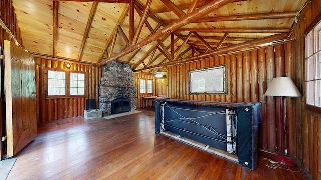 13000 Inlet Cir, Park Rapids, MN 56470 - living area featuring hardwood / wood-style flooring, plenty of natural light, a fireplace, wooden ceiling, and wood walls