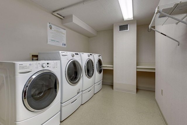 6500 Woodlake Dr Unit 1006, Richfield, MN 55423 - laundry area featuring washer and clothes dryer and light floors