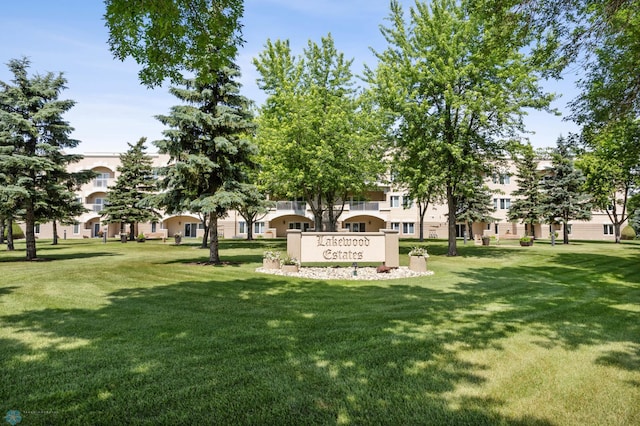 2501 30th Ave S Unit 203, Fargo, ND 58103 - view of community featuring a lawn