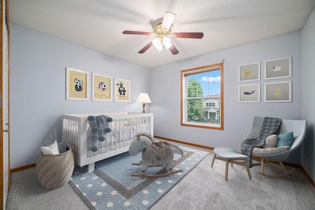 6800 Troy Ln N, Maple Grove, MN 55311 - bedroom with carpet, ceiling fan, and a nursery area