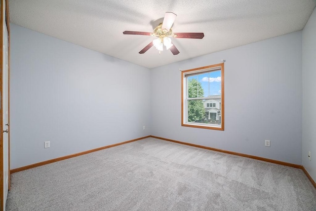6800 Troy Ln N, Maple Grove, MN 55311 - carpeted spare room featuring ceiling fan and a textured ceiling