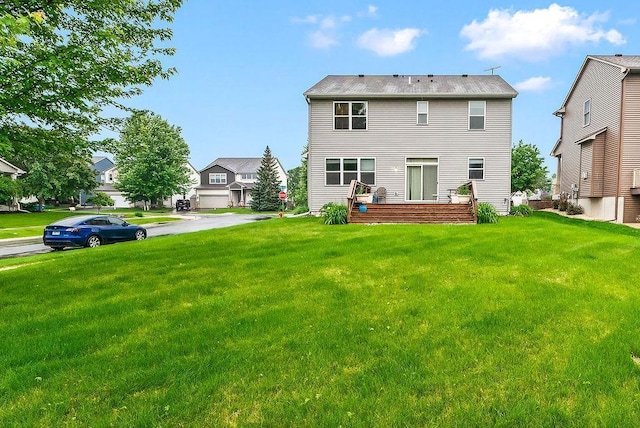 6800 Troy Ln N, Maple Grove, MN 55311 - rear view of property featuring a lawn