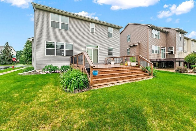 6800 Troy Ln N, Maple Grove, MN 55311 - rear view of house with a wooden deck and a yard