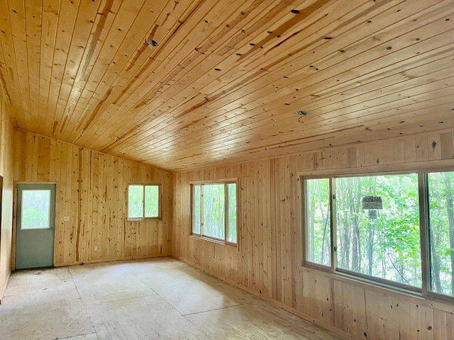 111 Wakeman Bay Rd, Wabana Twp, MN 55744 - empty room featuring wood ceiling, lofted ceiling, and wood walls