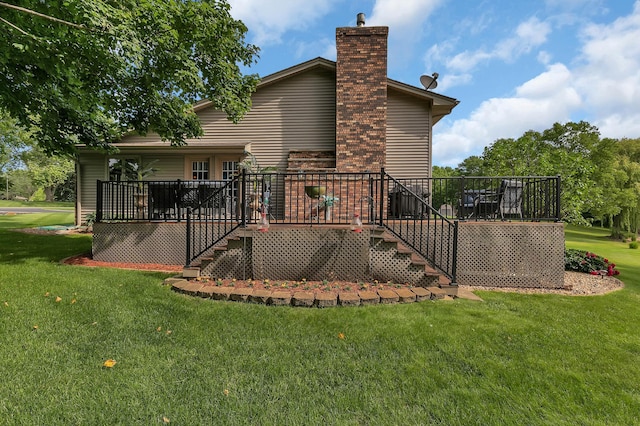 1506 Jackson Ave NE, Saint Michael, MN 55376 - back of property with stairway, a chimney, a yard, and a wooden deck